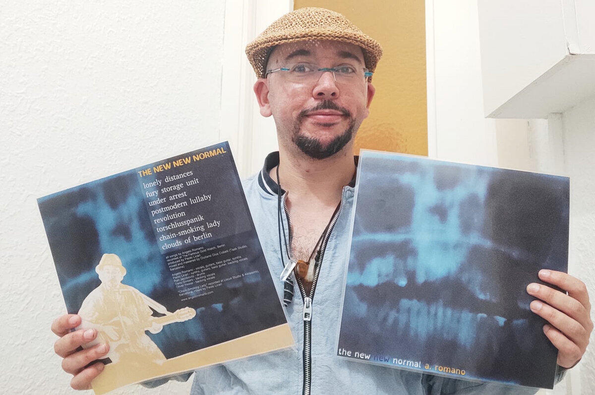 Angelo Romano holding his vinil record Angelo Romano holding his vinil record